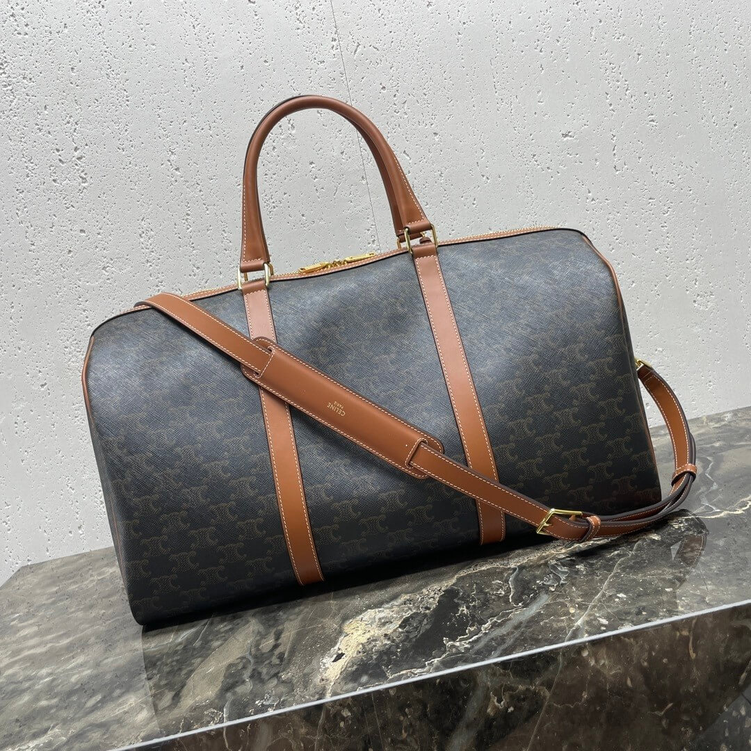 Ce**e medium duffle bag in logo-print calfskin