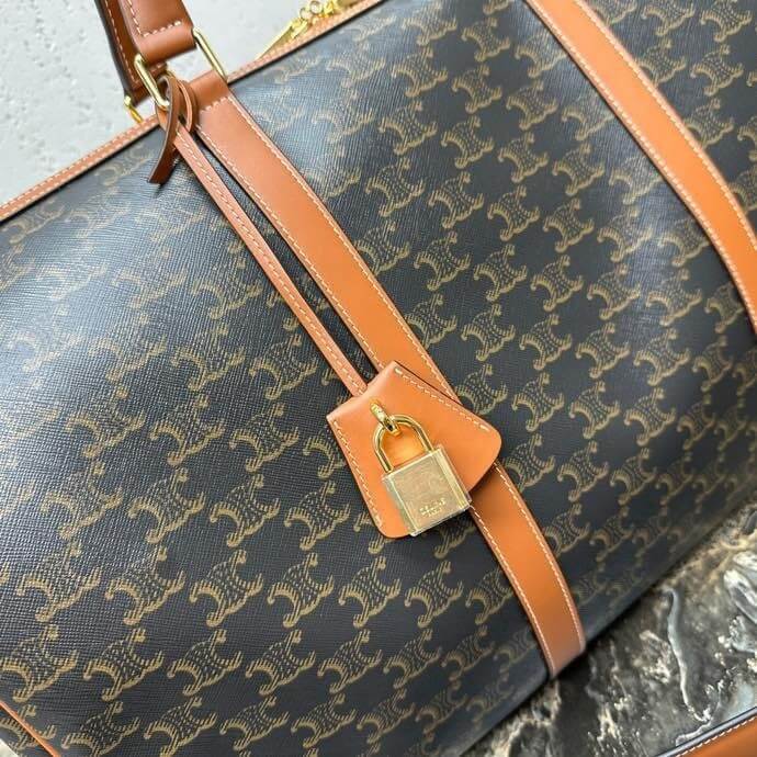 Ce**e large travel bag in logo print and calfskin
